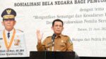 Gubernur Kepulauan Riau, Ansar Ahmad, menyampaikan kata sambutan sekaligus membuka kegiatan Sosialisasi Bela Negara Bagi Pemuda dan Mahasiswa se-Kota Batam